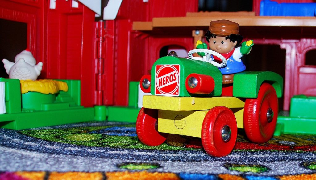 Image of a toy tractor evocative of fun kids games.